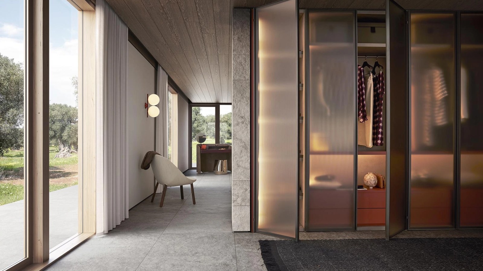 Backlit walk-in wardrobe with glass fronts